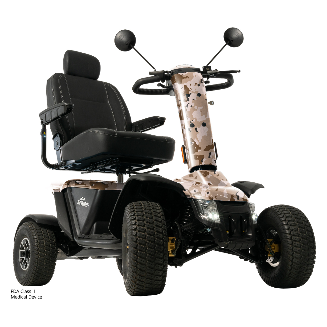 The Pride Baja® Wrangler® 2 Heavy Duty Outdoor Scooter with Canopy is an all-terrain scooter featuring a camouflage body, black cushioned seat with armrests and headrest, rugged tires, handlebar controls with mirrors, and top outdoor performance.