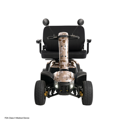 Front view of the Pride Baja® Wrangler® 2 Heavy Duty Outdoor Scooter in camouflage with black seat, twin rearview mirrors, headlights on, set against a white background. "FDA Class II Medical Device" text appears in the corner.