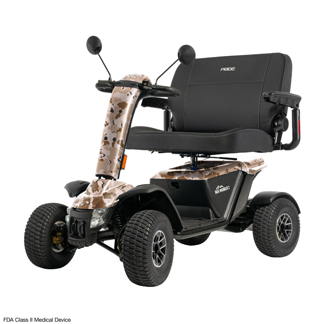 The Pride Baja® Wrangler® 2 Heavy Duty Outdoor Scooter is a four-wheeled all-terrain model with rugged tires, camouflage accents, a black padded seat with armrests, and rear-view mirrors, built for outdoor use.
