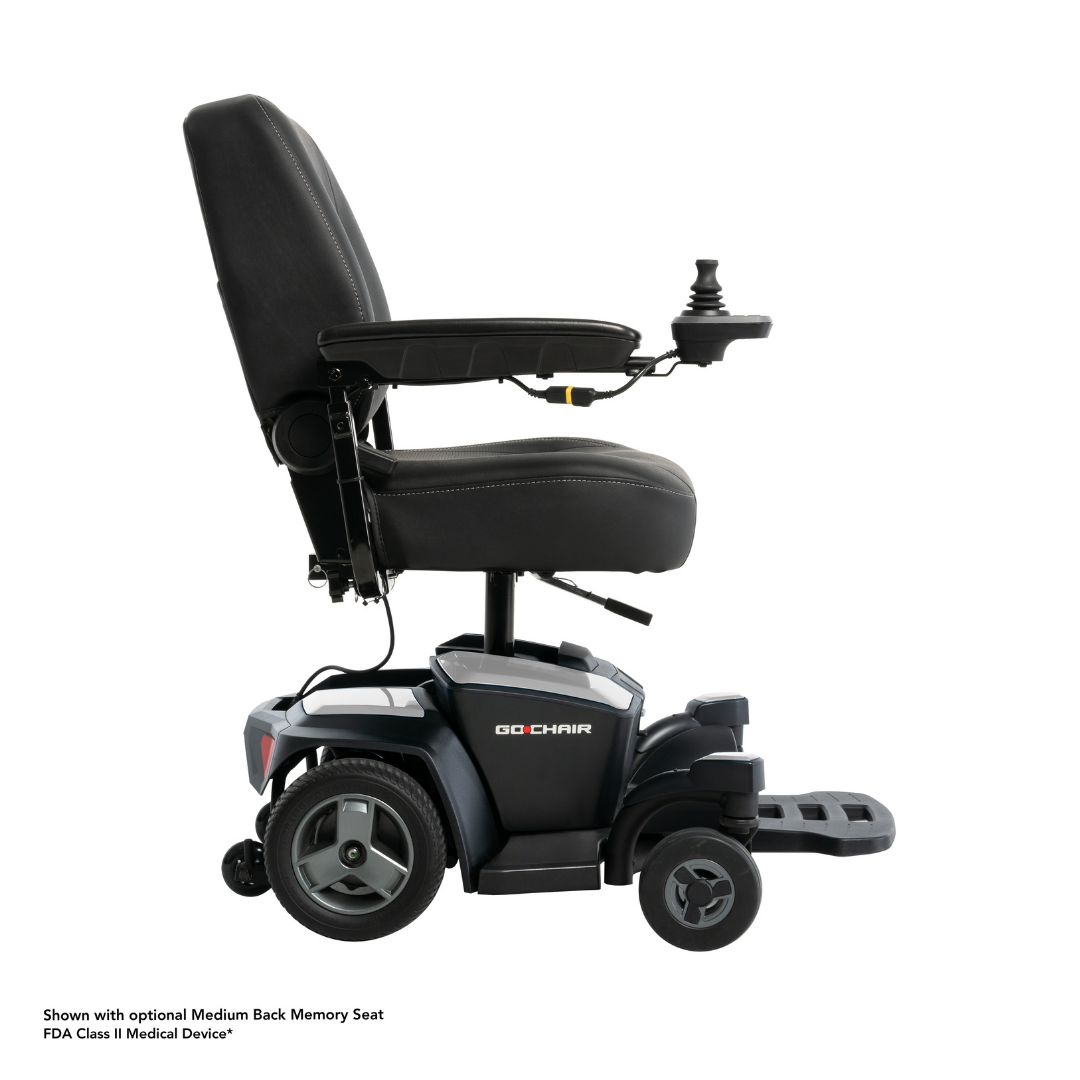 The Pride Mobility Go Chair® Portable Powerchair is shown in side profile against a white background. This black chair features a medium back memory seat, padded armrests, footrest, right-arm joystick control, and compact turning radius.