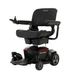 The Pride Mobility Go Chair® Portable Powerchair features a black and red design, right-arm joystick control, padded seat, and footrest—offering reliable mobility assistance and enhanced agility.
