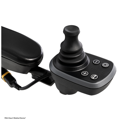Close-up of the Pride Mobility Go Chair® Portable Powerchair’s black joystick controller, featuring plus, minus, power, and horn buttons on the armrest of this high weight capacity mobility device.
