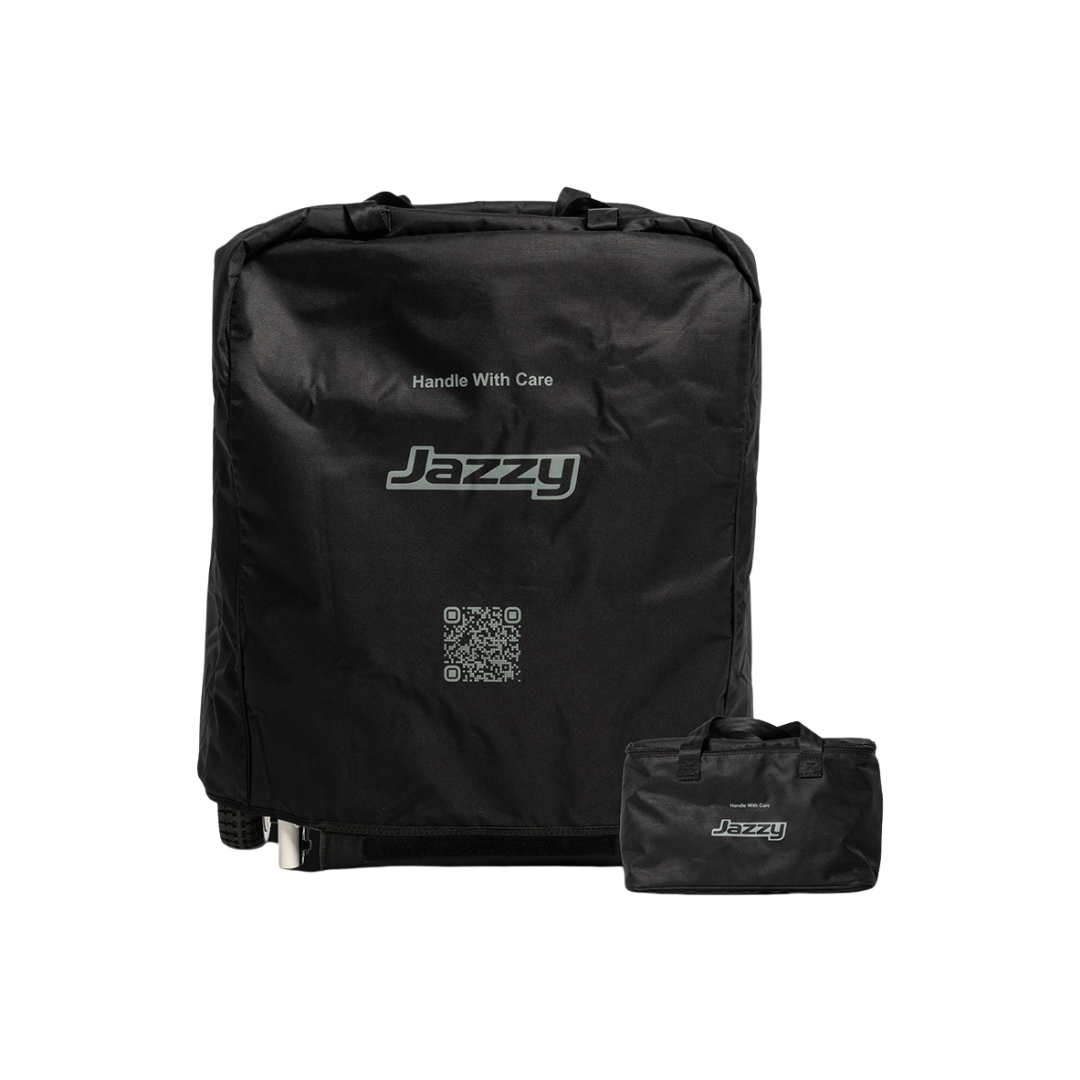 A black Accessories For The Jazzy® Carbon HD Powerchair carrying case with "Handle With Care" text and a QR code on the front is shown next to a smaller folded version of the same case.