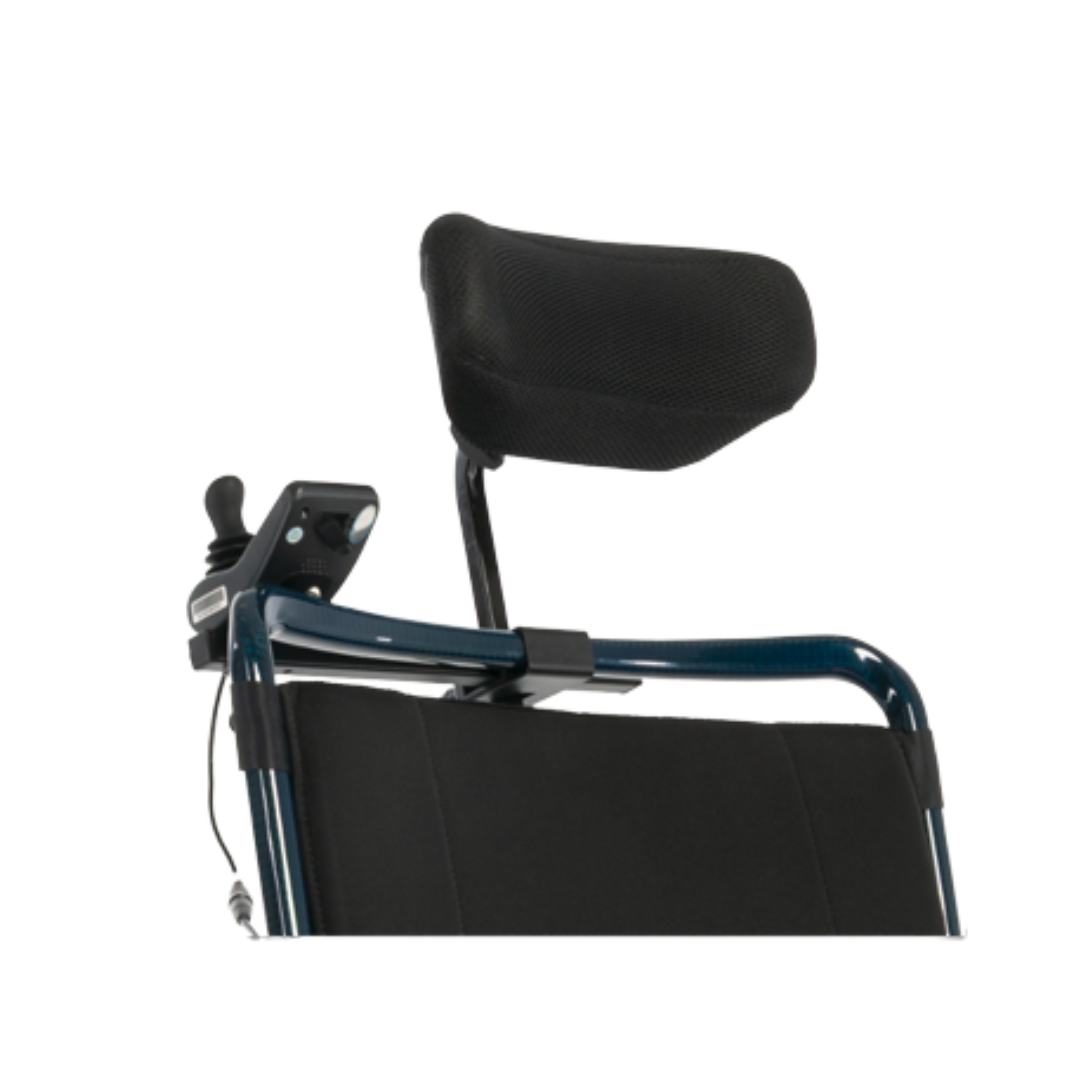 A close-up of the Jazzy® Carbon HD Powerchair’s upper backrest, showing a black padded headrest, left-side joystick control panel, and Accessories For The Jazzy® Carbon HD Powerchair for enhanced comfort.