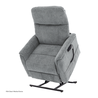The Pride Mobility Genesis LC150 Lift Chair Recliner, shown slightly tilted forward, demonstrates its stand-assist feature. A remote control is attached to the right armrest by a cord. See product description for full specs.