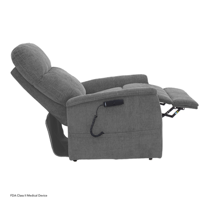 The Pride Mobility Genesis LC150 Lift Chair Recliner, shown in gray upholstery and fully reclined, features an attached wired remote resting on the armrest. Refer to the spec table for full product details and specifications.
