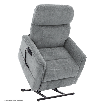 The Pride Mobility Genesis LC150 Lift Chair Recliner features light gray upholstery, padded armrests, a side-attached remote, and a black metal lift base. See product specifications for more details.