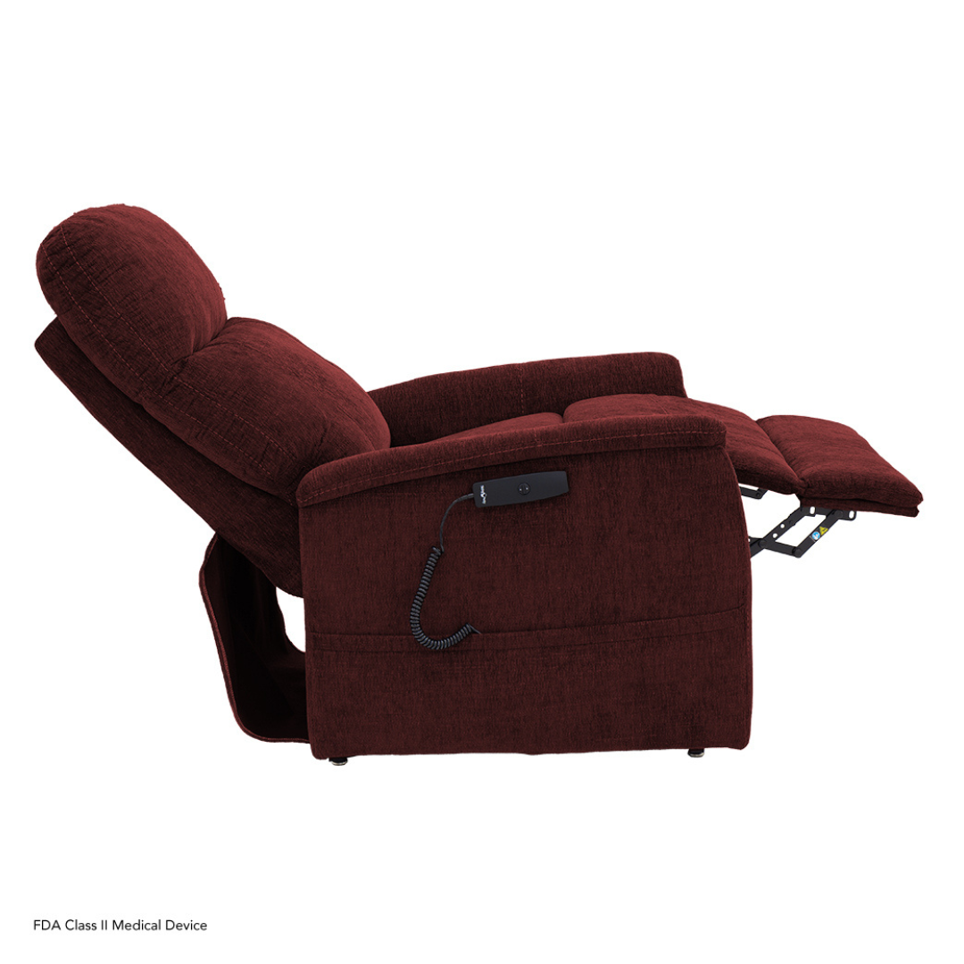 The Pride Mobility Genesis LC150 Lift Chair Recliner in maroon is fully reclined with an extended footrest and features a plush backrest, seat, and a wired remote on the side. See product specifications for details. Background is plain white.