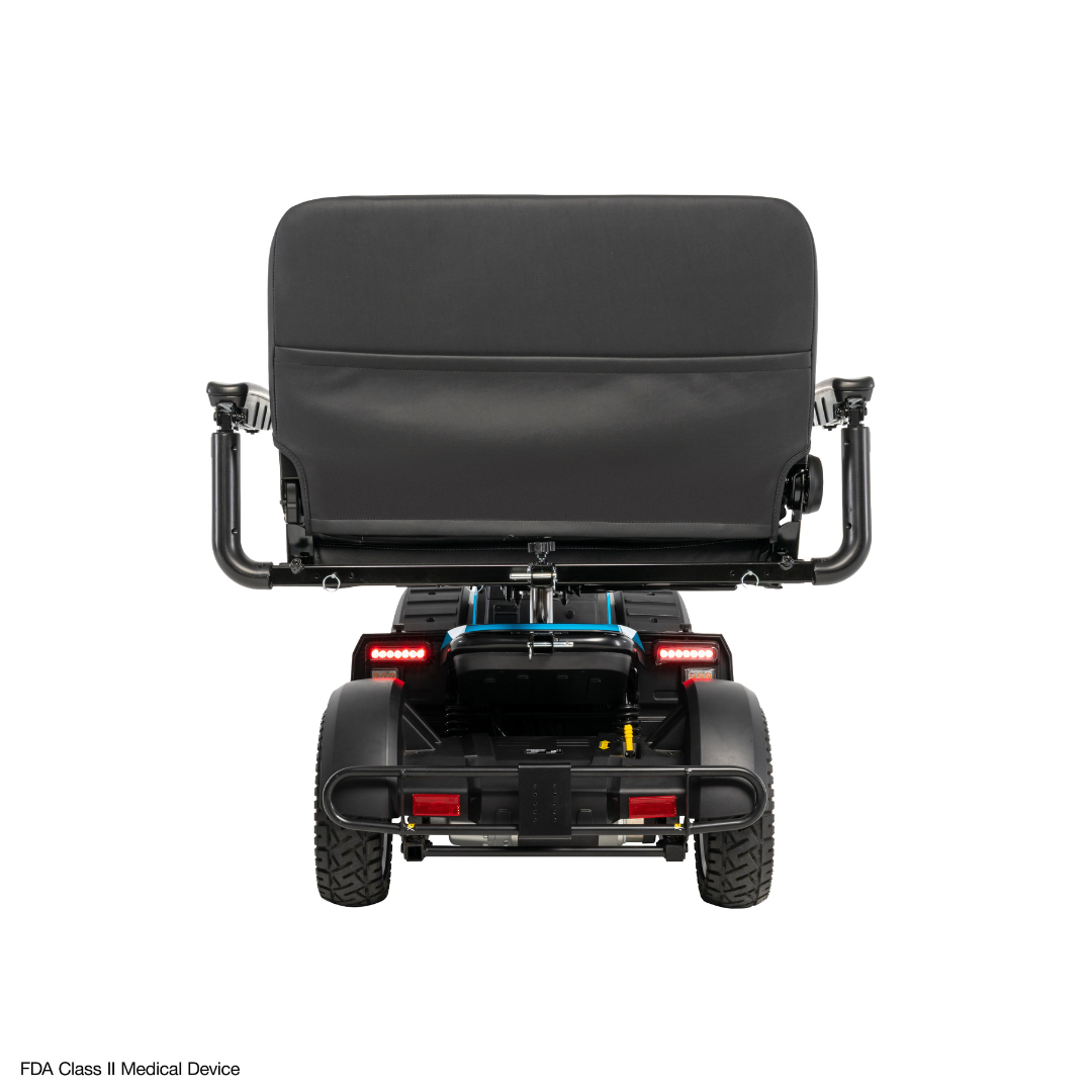 Rear view of the Pride Mobility PX4 HD Bariatric Scooter with large tires, wide seat, raised armrests, taillights, and sturdy frame. Text in the corner: FDA Class II Medical Device.