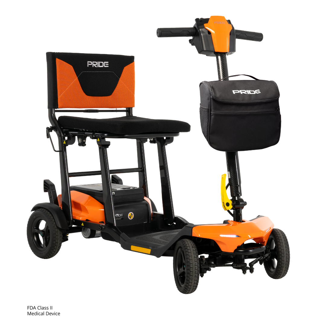 The Pride Mobility Go Go® Super Portable Mobility Scooter features an orange and black frame, cushioned seat with "Pride" backrest, handlebar storage bag, and is an FDA Class II medical device.