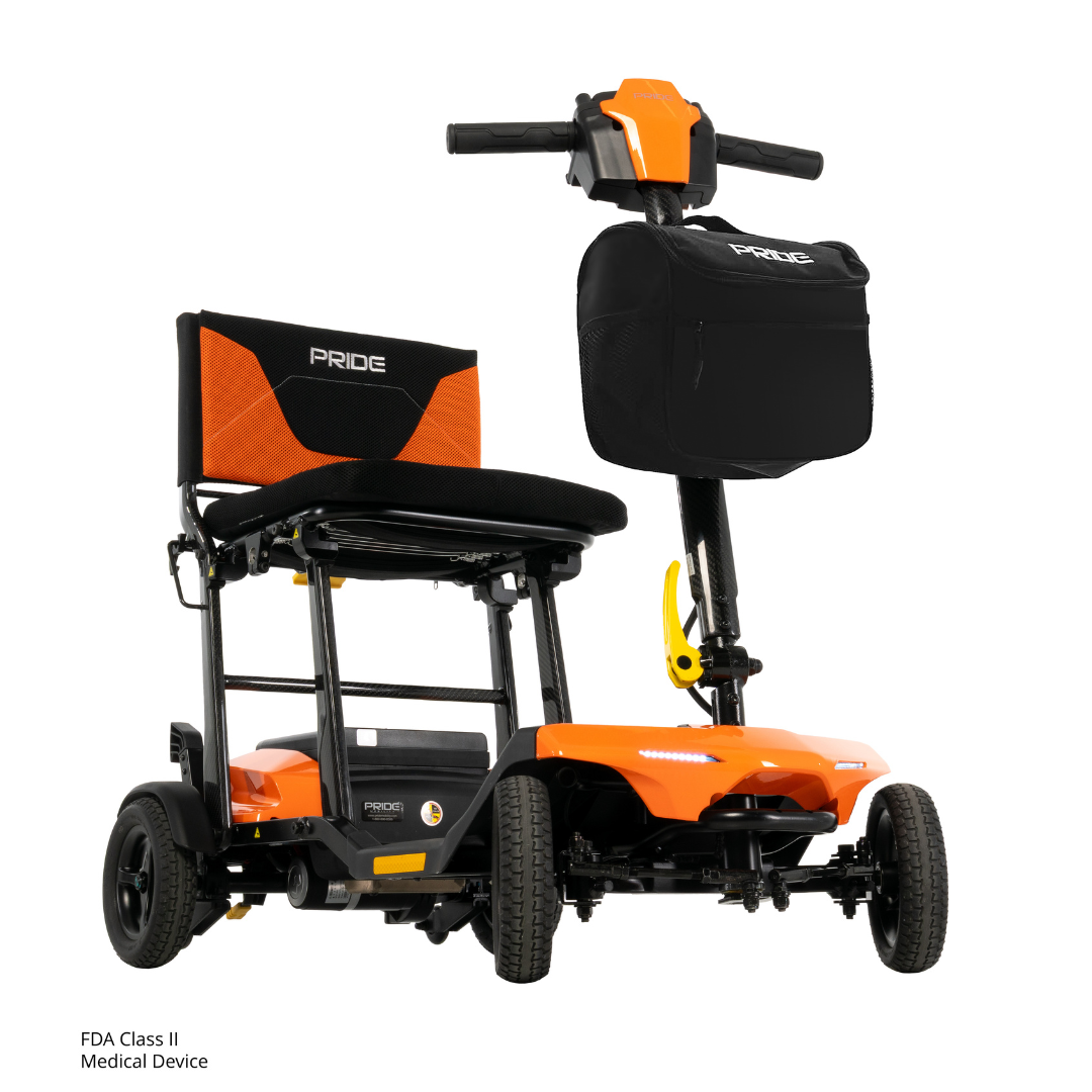 The Pride Mobility Go Go® Super Portable Mobility Scooter is a compact, orange four-wheel scooter with black-and-orange cushioned seat, handlebars, and a front black storage pouch—ideal for daily portable mobility.