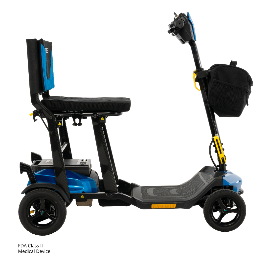 The Pride Mobility Go Go® Super Portable Mobility Scooter is a blue and black four-wheeled scooter with a seat, backrest, handlebar, and front black storage bag. This compact model is an FDA Class II medical device.