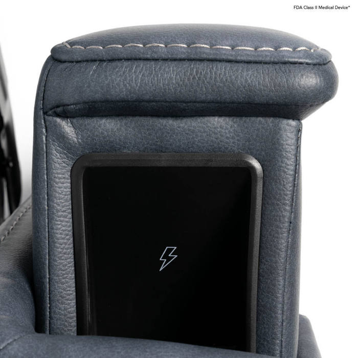 Close-up of a dark blue leather armrest with visible stitching and a built-in black wireless charging pad—an elegant feature found on the Pride VivaLift Ultra PLR4955 Recliner with Lift Assist, Heat, and Massage.