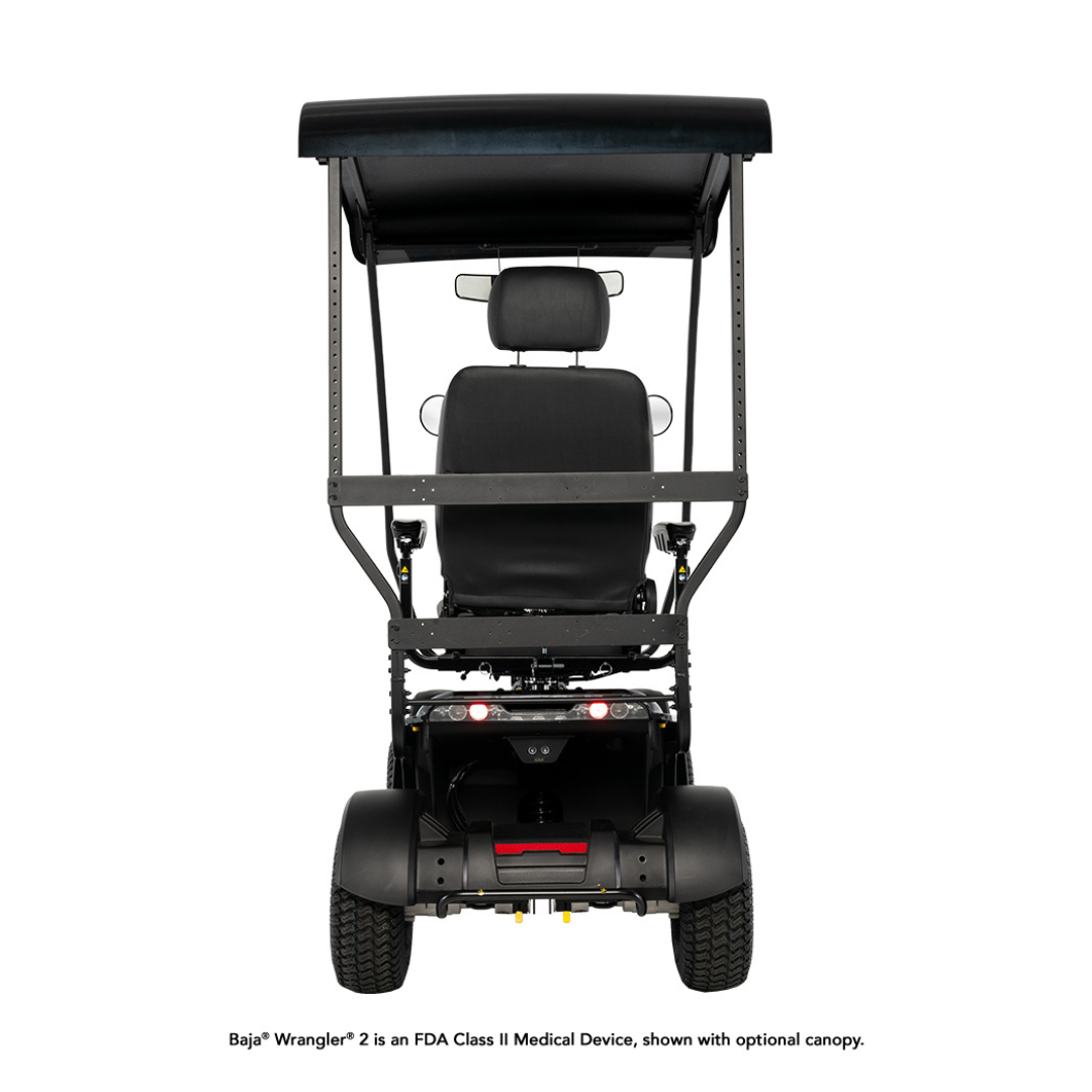 Rear view of the Pride Baja® Wrangler® 2 Heavy Duty Outdoor Scooter with Canopy in black, featuring large tires, a padded seat, backrest, armrests, and advanced safety features for rugged outdoor use; shown on a white background.