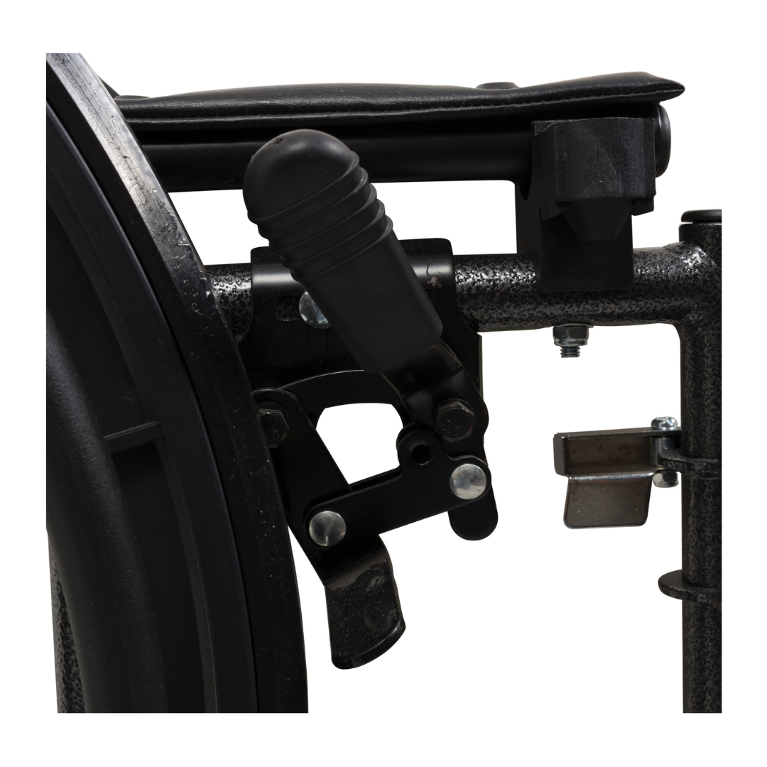 Close-up of a black manual brake lever with textured metal components and bolts, attached to the side frame near the wheel on a ProBasics Standard Hemi K2 Wheelchair with swing-away footrests.