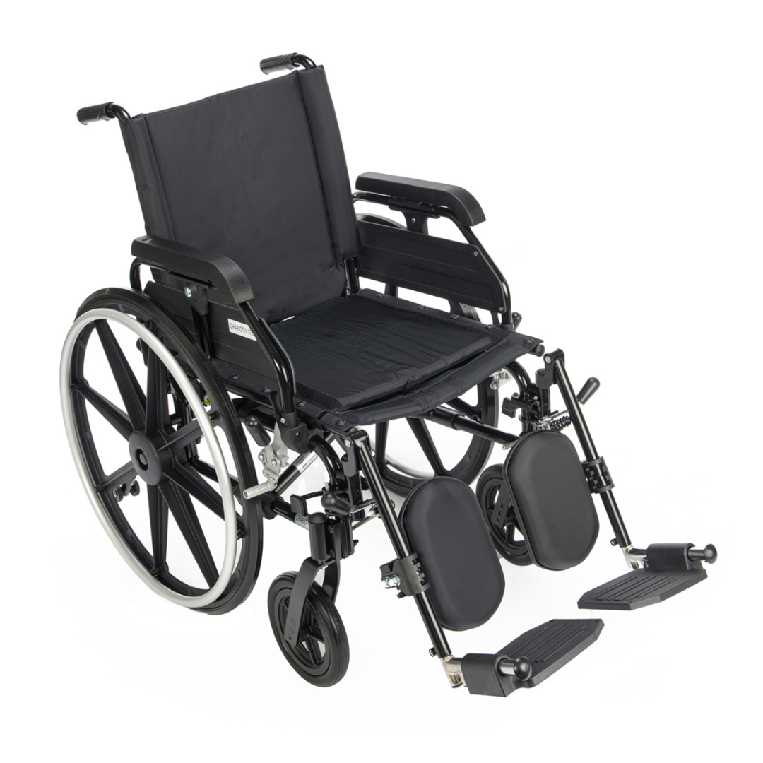 A Proactive Chariot IV XTC Wheelchair with adjustable seat depth, black frame, large rear wheels, smaller front wheels, padded armrests, and elevated leg rests is shown on a white background.
