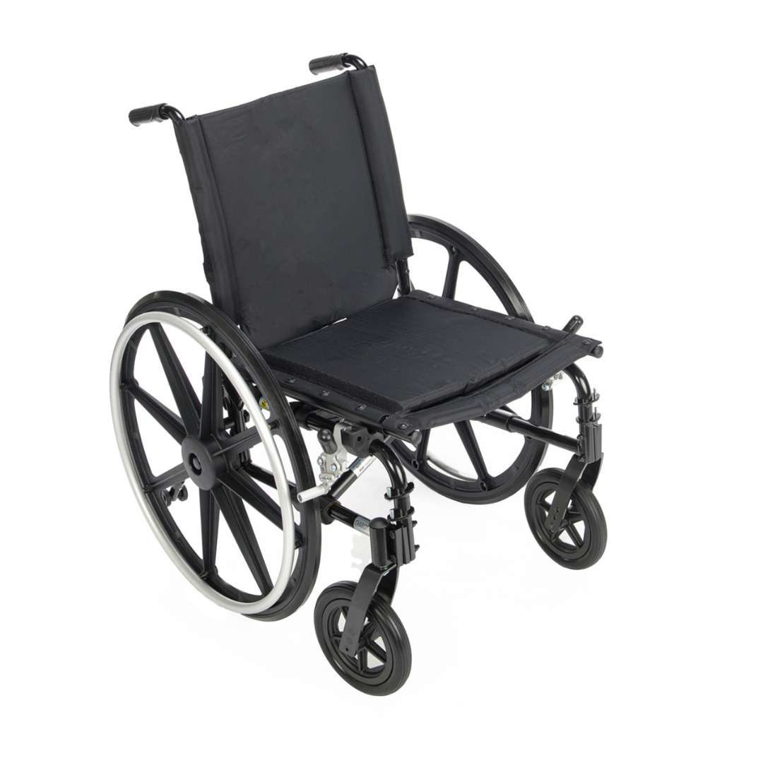 The Proactive Chariot IV XTC Wheelchair with Adjustable Seat Depth is a black, lightweight chair featuring large rear wheels, small front casters, a simple seat and backrest, plus push handles, displayed on a white background.