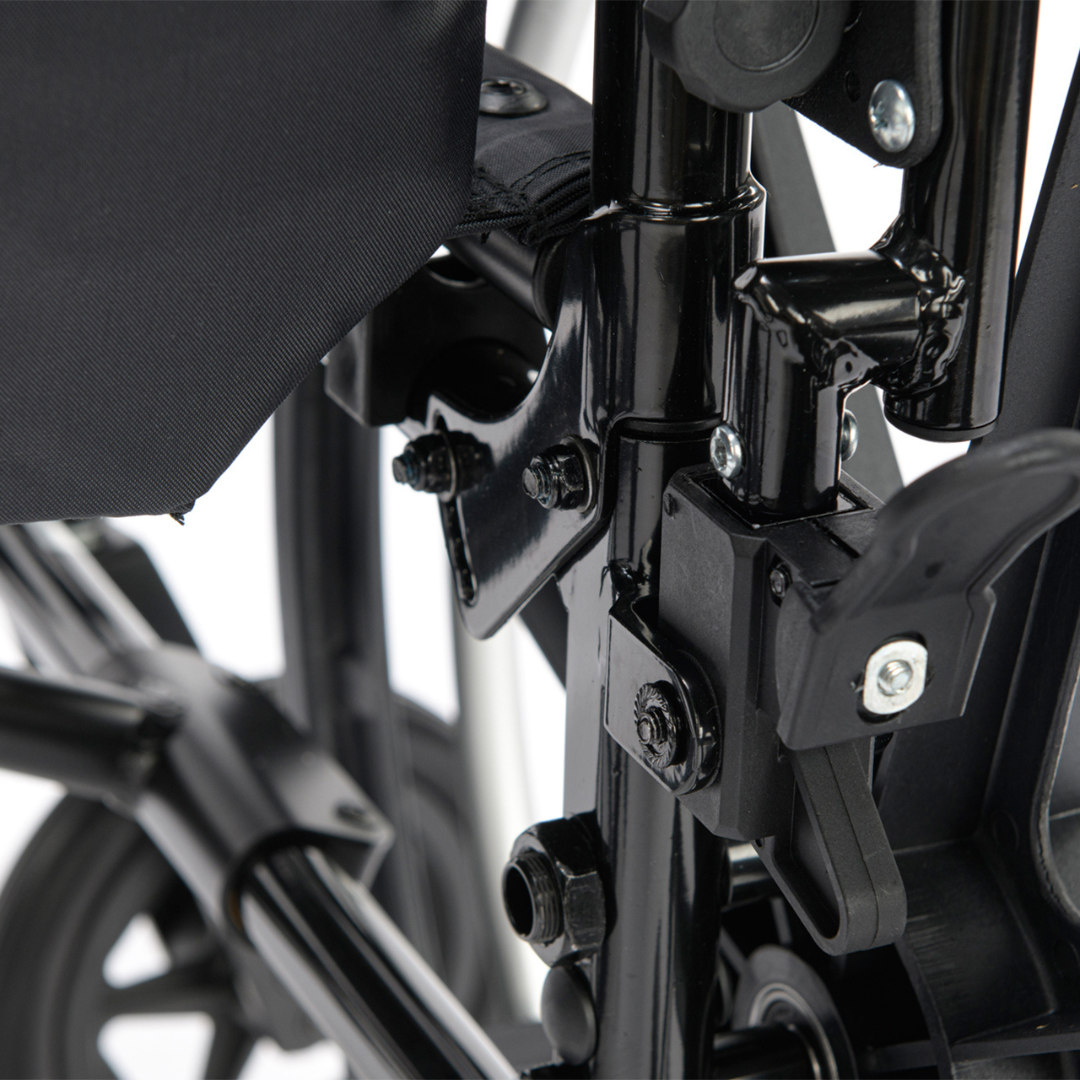 Close-up view of the black metal folding mechanism and hardware of the Proactive Chariot IV XTC Wheelchair with Adjustable Seat Depth, highlighting detailed hinges, bolts, and frame components.