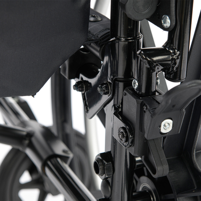 Close-up view of the black metal folding mechanism and hardware of the Proactive Chariot IV XTC Wheelchair with Adjustable Seat Depth, highlighting detailed hinges, bolts, and frame components.