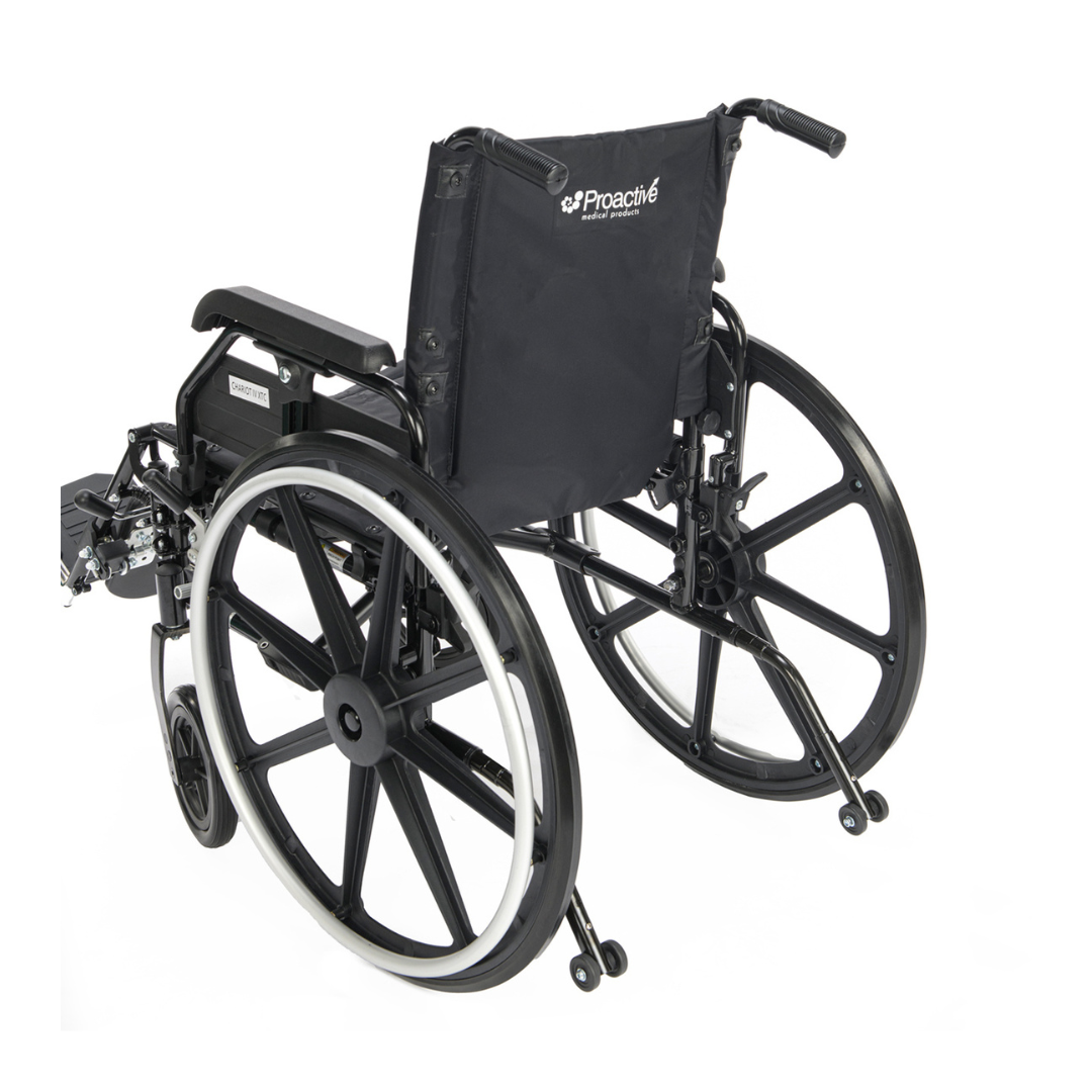 A black Proactive Chariot IV XTC Wheelchair with Adjustable Seat Depth, shown from the back and side, features large rear wheels, small front casters, armrests, and a Proactive logo on the backrest.