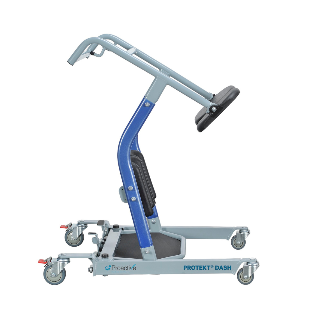 A side view of the Proactive Protekt® Dash Sit-To-Stand Transfer Aid in silver and blue, featuring four caster wheels, padded supports, handles, and "PROTEKT DASH" and "Proactive" labels on its base.