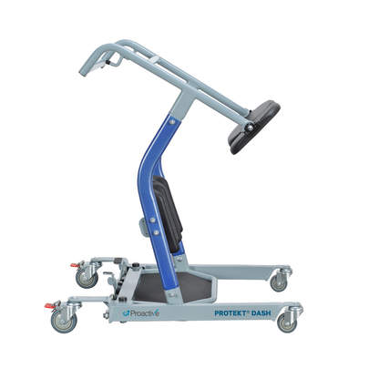 A side view of the Proactive Protekt® Dash Sit-To-Stand Transfer Aid in silver and blue, featuring four caster wheels, padded supports, handles, and "PROTEKT DASH" and "Proactive" labels on its base.