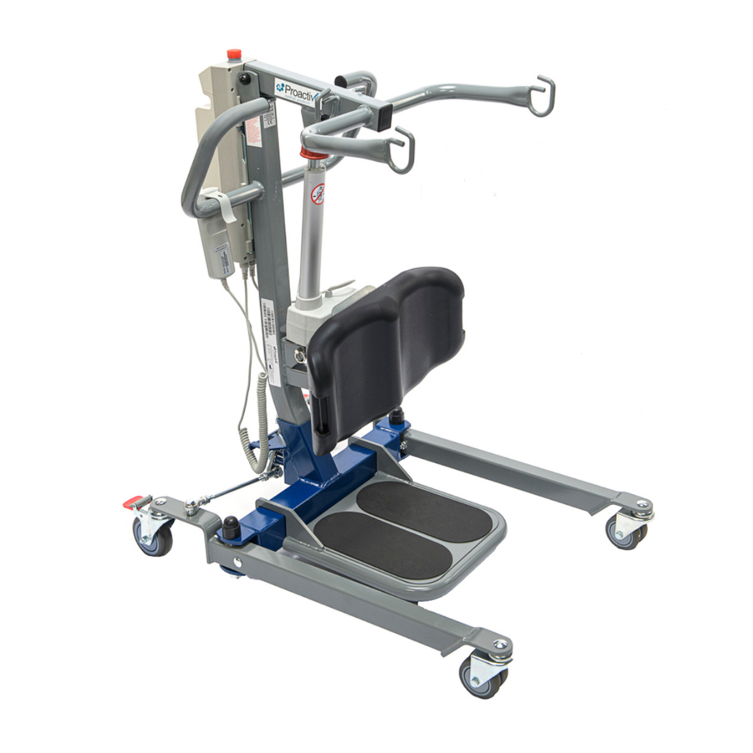The Proactive Protekt® Compact 500 Sit-To-Stand Patient Lift features padded knee supports, a foot platform, handles, and wheels to assist individuals with limited mobility in safe transfers.