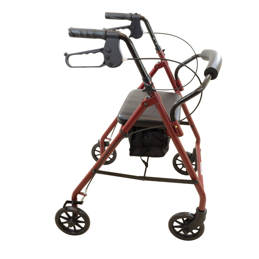 The ProBasics Lightweight Steel Portable KD Rollator, shown against a white background, features a red steel frame, four wheels, ergonomic hand brakes, a padded seat, and a black storage pouch.