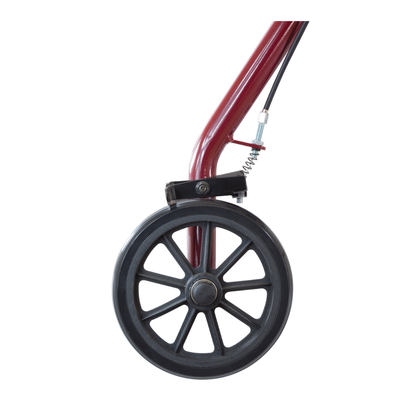 Close-up of a black plastic wheel attached to the red frame of the ProBasics Lightweight Steel Portable KD Rollator, shown isolated on a white background.