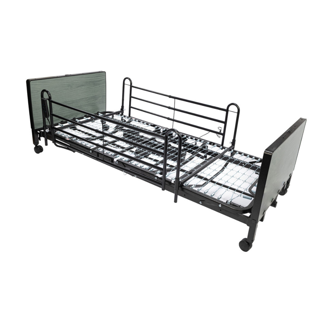 The Protekt Akra-FE™ Full-Electric Bariatric “Low” Bed is a metal hospital bed frame with side rails, wheels, and headboard and footboard panels (shown without a mattress), making it an excellent choice for homecare use.