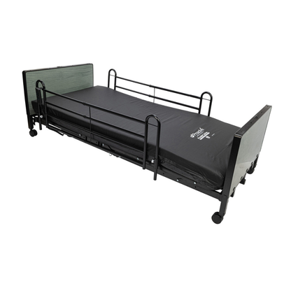 A black Protekt Akra-FE™ Full-Electric Bariatric “Low” Bed is displayed on a white background, featuring safety rails on both sides, wheels for easy mobility, and a dark mattress. Both the headboard and footboard are visible, emphasizing the bed’s adjustable and versatile design ideal for homecare settings.