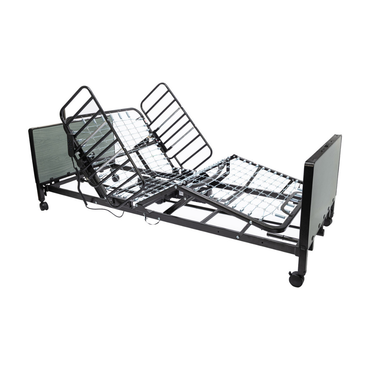 The Protekt Akra-FE™ Full-Electric Bariatric “Low” Bed is an adjustable hospital bed with metal rails and a segmented frame, featuring elevation at the head and legs and wheels for mobility, designed for use in both hospital and homecare settings.