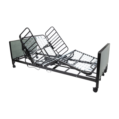 The Protekt Akra-FE™ Full-Electric Bariatric “Low” Bed is an adjustable hospital bed with metal rails and a segmented frame, featuring elevation at the head and legs and wheels for mobility, designed for use in both hospital and homecare settings.