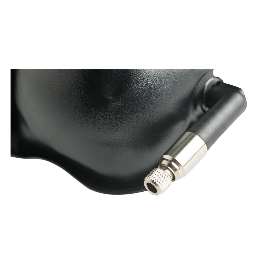 Close-up of the Protekt® Revel Air Cushion showing its black surface, metallic valve, and rubber hose connector against a white background.