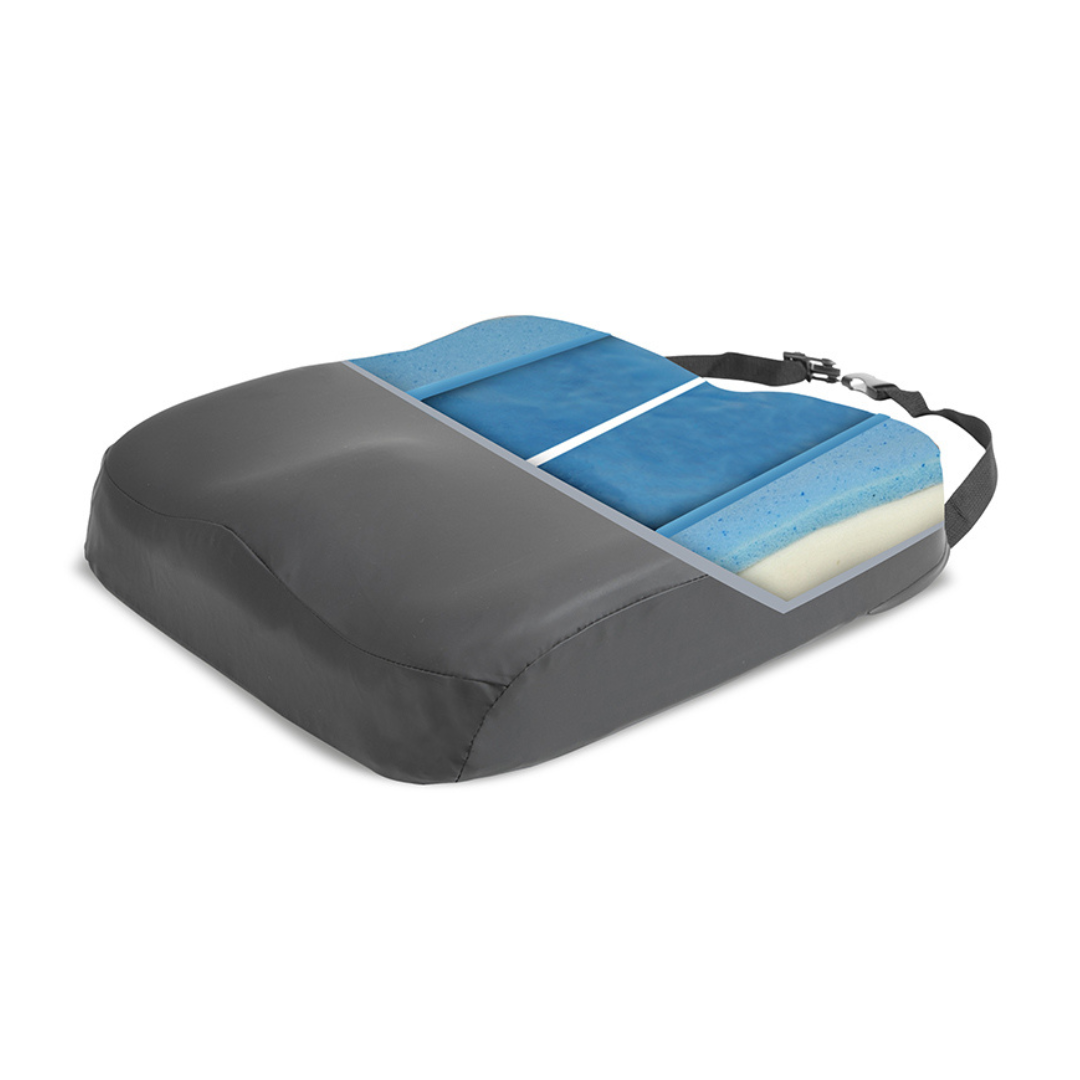 The Protekt® Ultra Molded Dual-Layer Portable Mobility Cushion is a gray memory foam wheelchair seat with a cutaway showing blue and white dual-layer foam for pressure relief and features an adjustable black strap on one side.