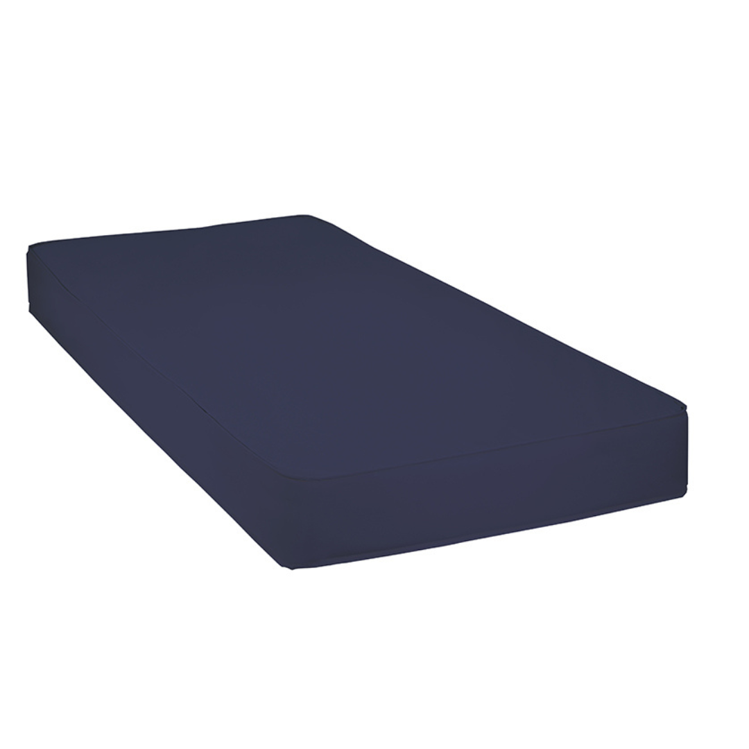 A Proactive Protekt® 100 Pressure Redistribution Foam Mattress with a navy blue fitted sheet is shown against a white background.