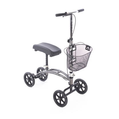 The Proactive Protekt® Gazelle Portable Knee Walker features four wheels, a padded seat, handlebars, and a front wire basket, offering a comfortable alternative to crutches for leg or foot injury recovery.