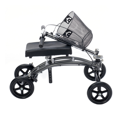 The Proactive Protekt® Gazelle Portable Knee Walker is a black, four-wheeled scooter with a padded seat, handlebars, and front wire basket, providing a convenient mobility alternative for foot and ankle recovery.