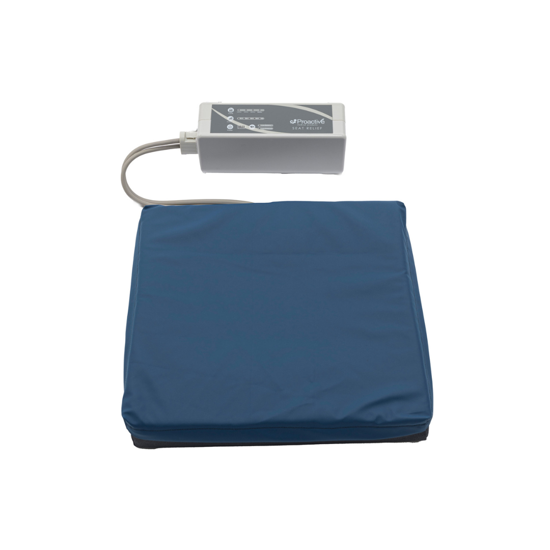 The Protekt® Seat Relief - Alternating Pressure Seat Cushion System by Proactive, featuring a blue cushion and electronic control unit, provides portable comfort and support for pressure injury prevention and relief. Shown isolated on a white background.
