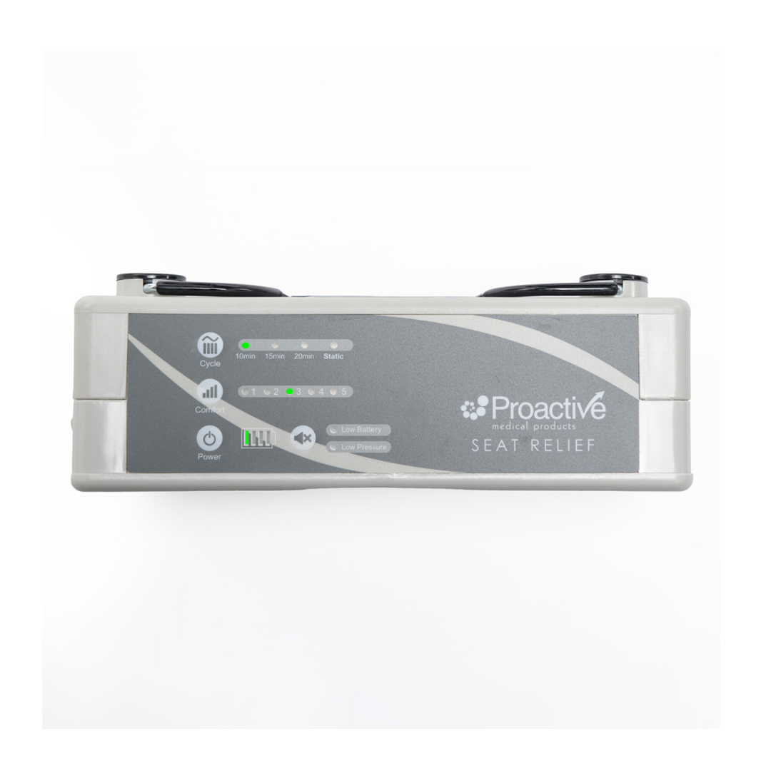 A rectangular device with buttons and indicator lights, labeled Protekt® Seat Relief - Alternating Pressure Seat Cushion System by Proactive, for pressure injury prevention, shown front-facing against a white background.