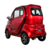 The Green Transporter Q Express Fully Enclosed Scooter features a compact, modern design with a glossy red exterior, black accents, and silver alloy wheels, shown from the back left on a white background.