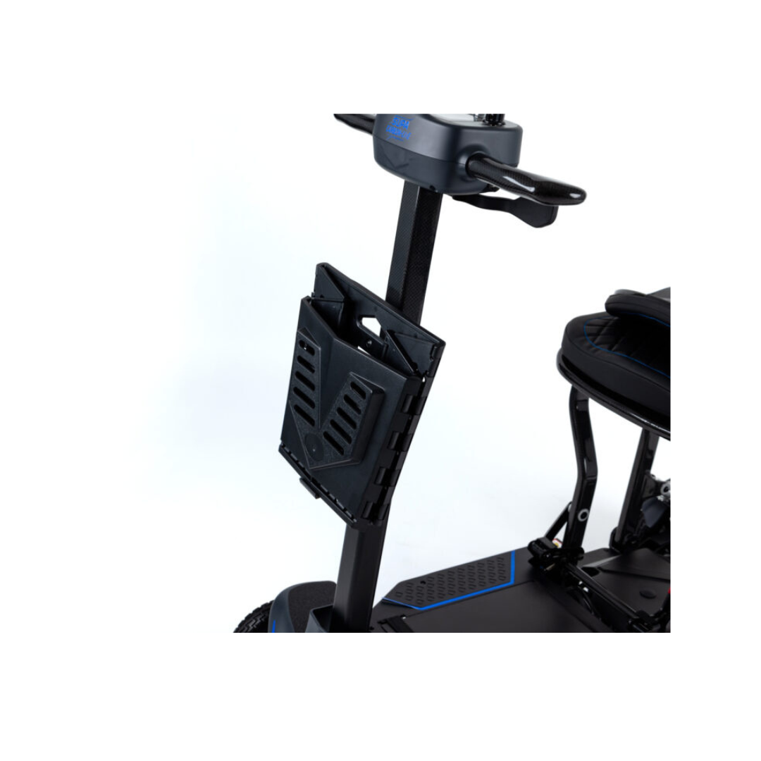 Close-up of a mobility scooter with a black folding cup holder on the steering column and the seat and footrest partly visible. For added convenience, a Quick Release Folding Basket For Monarch Genie Scooters can also be attached.