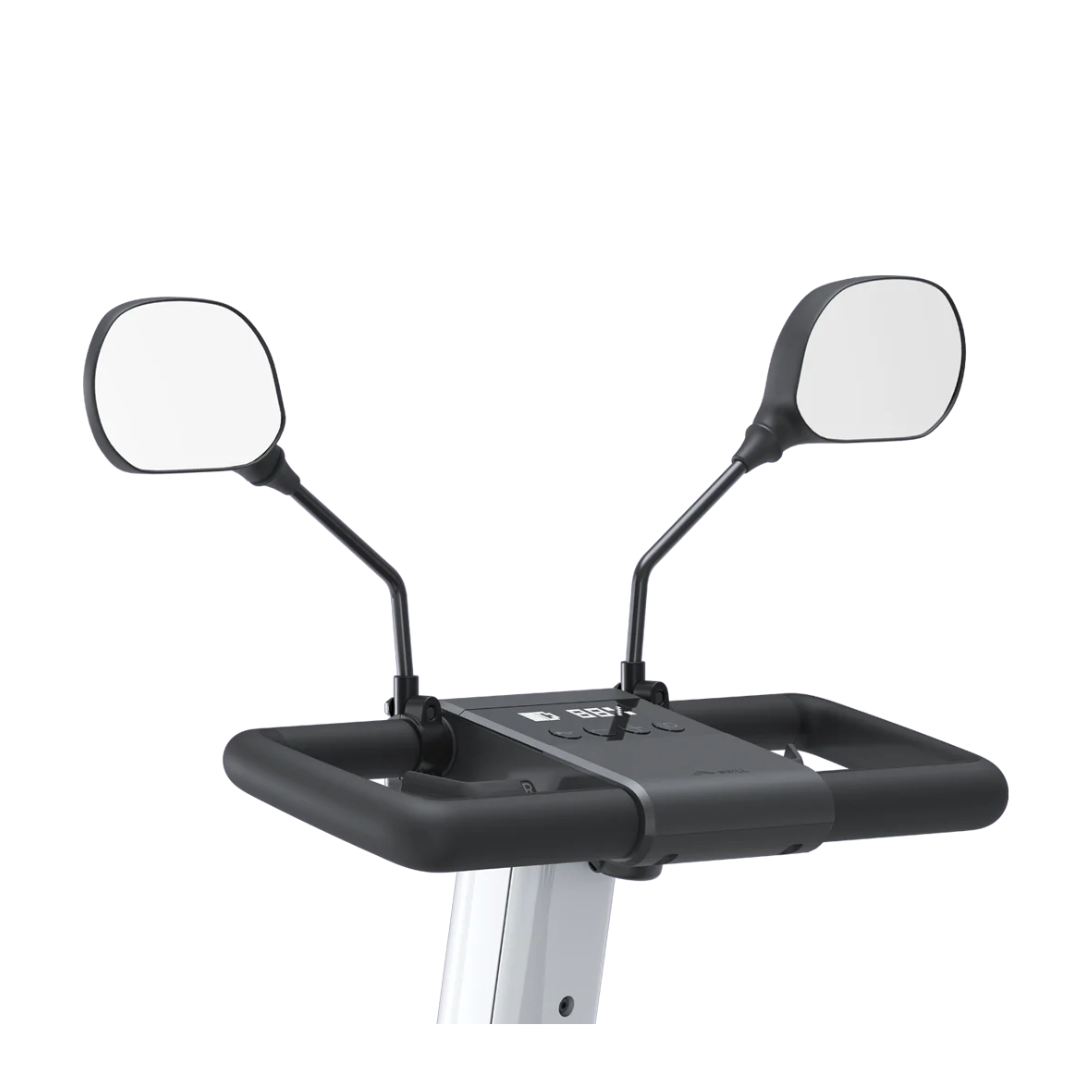 A close-up of the Rearview Mirror for WHILL Model R shows two outward-angled mirrors attached to a black rectangular handlebar, set against a white background.