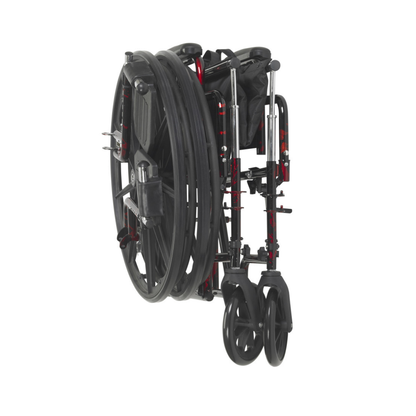 The Drive Rebel Wheelchair with Quick-Release Wheels in black and red is fully folded, showcasing its compact, space-saving design with wheels aligned closely and footrests tucked in.