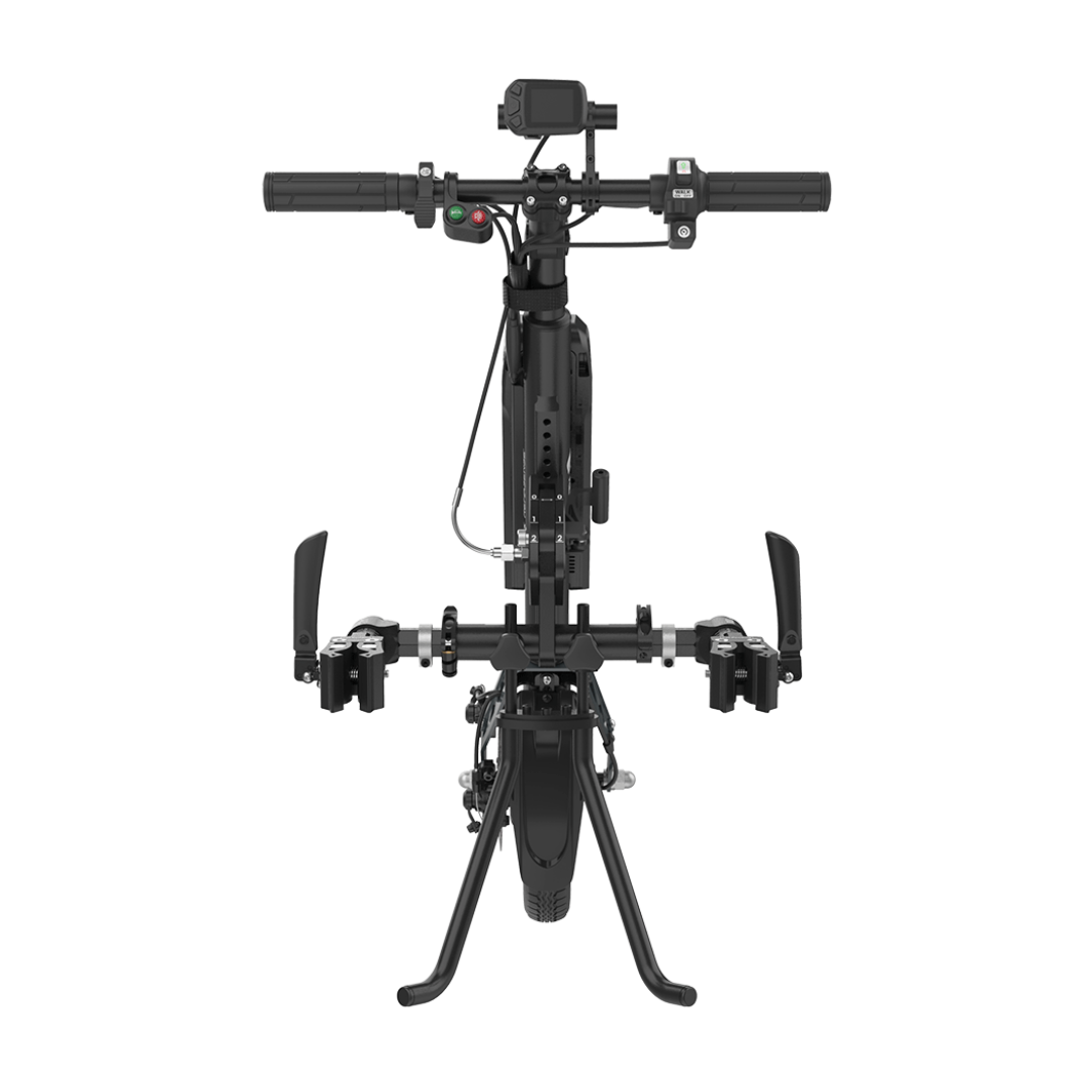 Front view of the Rehasense ECO Assist Power Chair Conversion System in black, on a kickstand, showing handlebars, digital display, brake levers, and foot pedals—a modern mobility solution with frame and wheel aligned vertically.