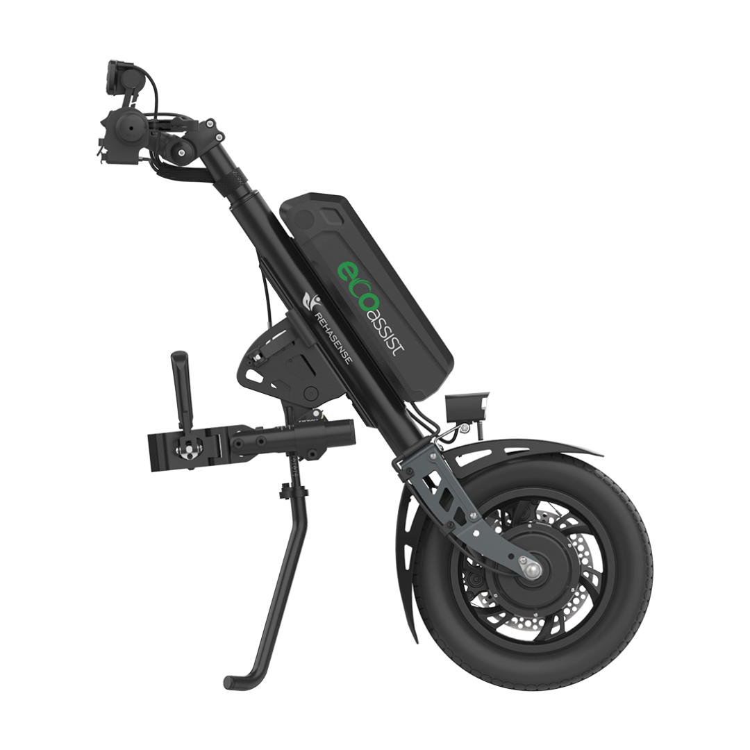 The Rehasense ECO Assist Power Chair Conversion System is a black ecoASSIST-branded add-on with battery, handlebar, kickstand, and large front tire—designed to convert a manual wheelchair into an electric-powered chair.