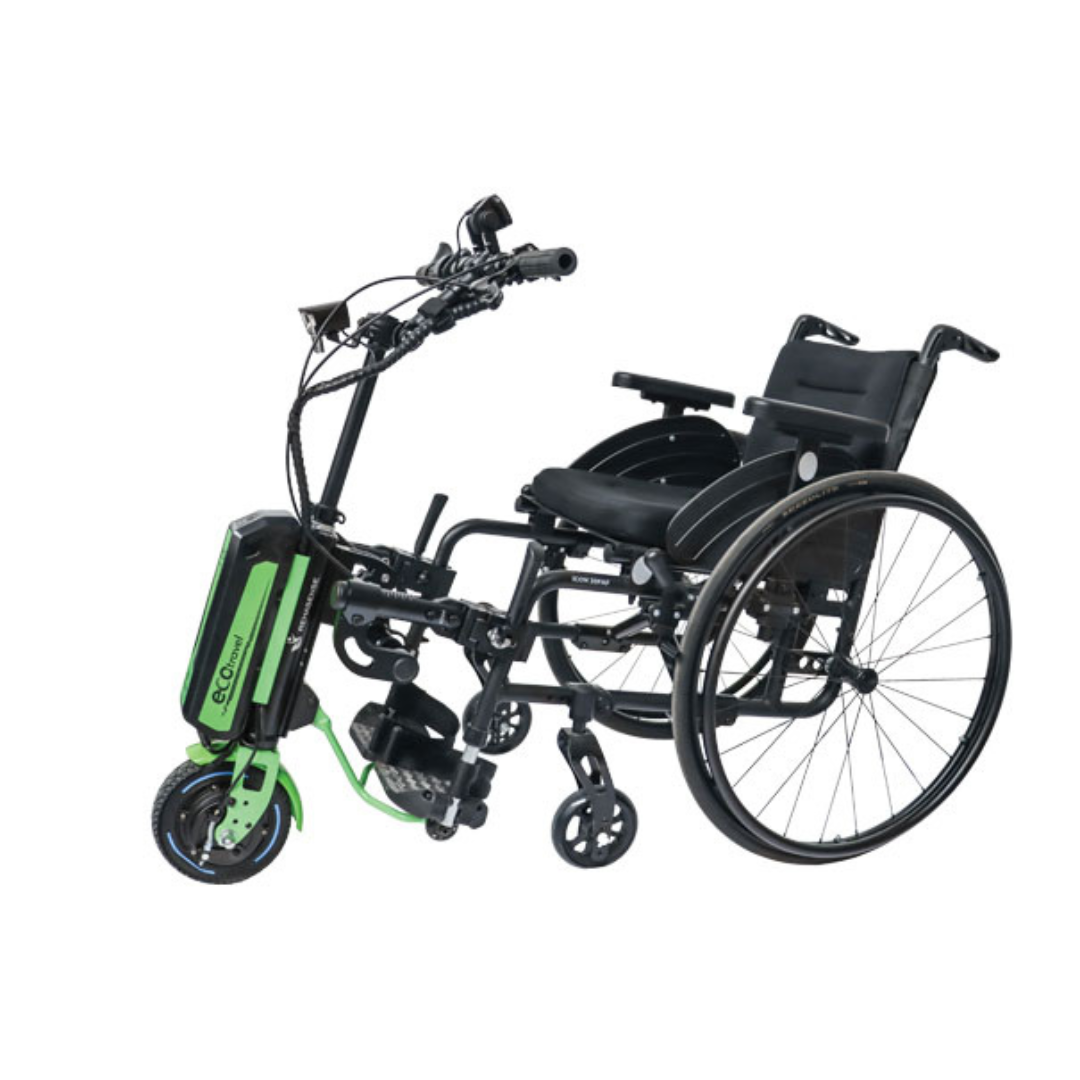A manual wheelchair fitted at the front with a green Rehasense ECO Travel LX Power Add-On – Lightweight Wheelchair Motor Assist, featuring handlebars and a small wheel to enhance mobility and enable powered movement.