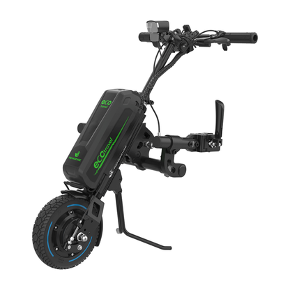 The Rehasense ECO Travel LX Power Add-On – Lightweight Wheelchair Motor Assist is a black and green device with handlebars, a large battery, and a single tire that converts a manual wheelchair into a motorized one.