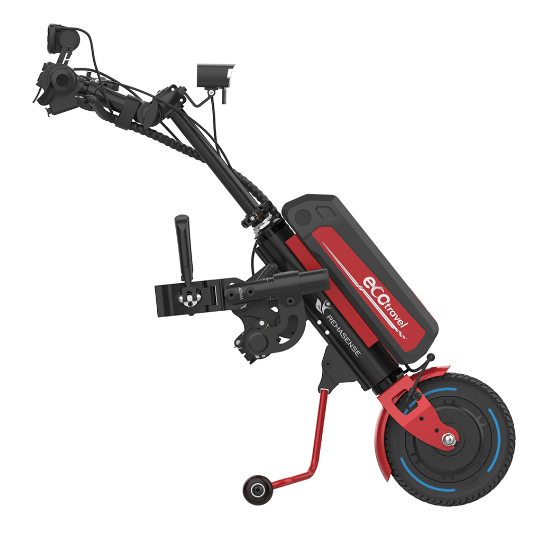 The Rehasense ECO Travel LX Power Add-On is a compact, foldable motor assist for manual wheelchairs with a single front wheel, red and black frame, labeled battery pack, handlebars, kickstand, and control components.