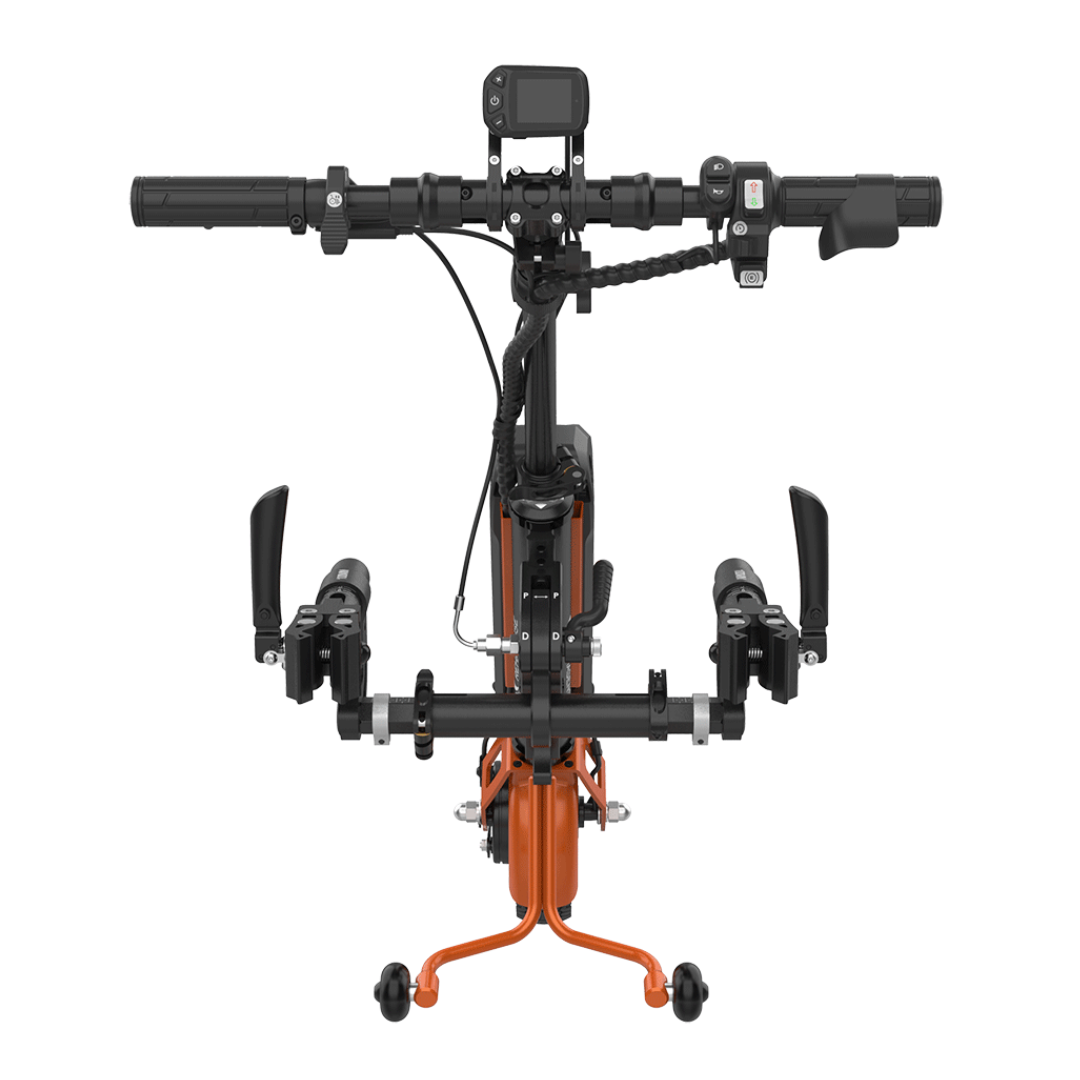 Front view of the Rehasense ECO Travel LX Power Add-On – Lightweight Wheelchair Motor Assist in black and orange, featuring handlebars, control panel, and docking mechanisms for easy attachment to manual wheelchairs.